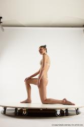 Underwear Woman White Kneeling poses - ALL Athletic Kneeling poses - on one knee long brown Multi angle poses Academic